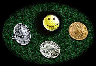 golf balls , golf ball markers , golf